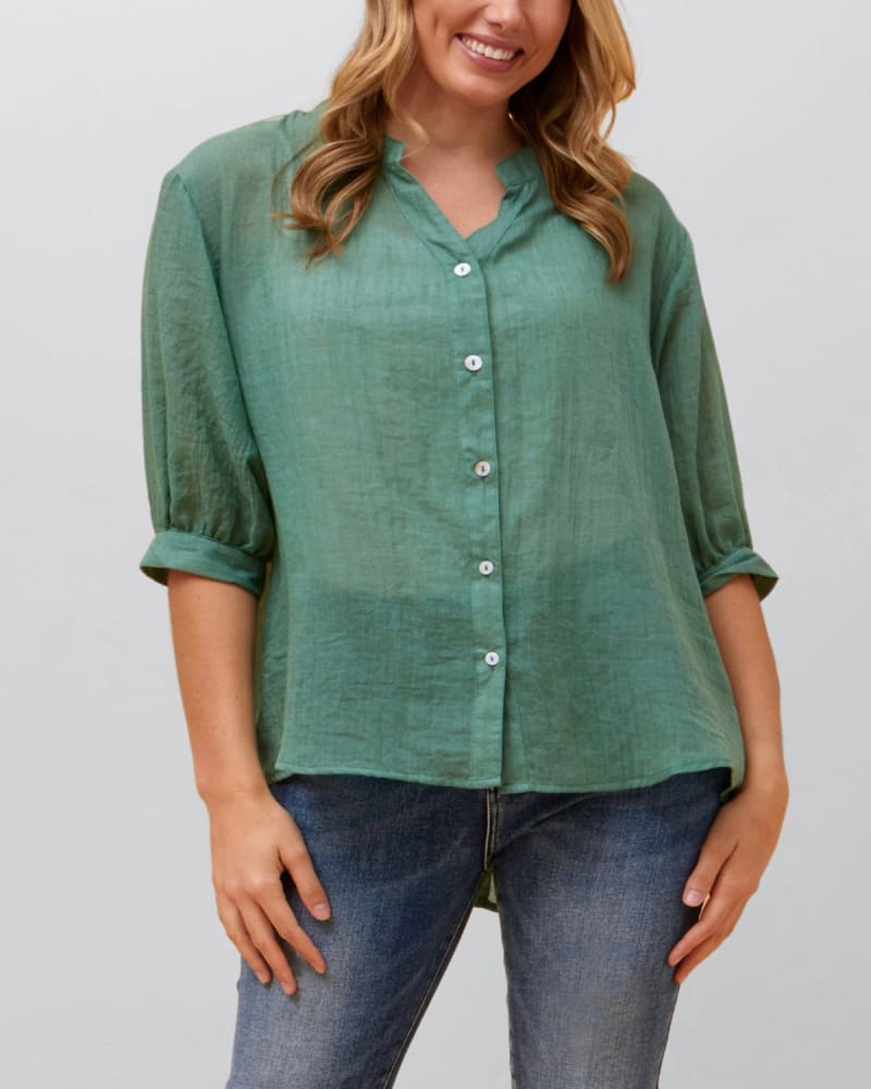 Front of a model wearing a size XL Roxanne Oversized Semi-Sheer Shirt Blouse Solid in Green by ANNICK. | dia_product_style_image_id:352504